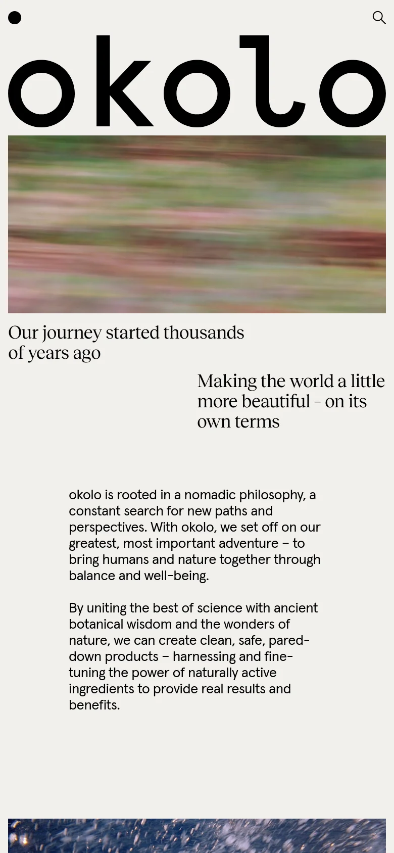 The mobile version presents a vertically stacked layout optimized for small screens. The hero image is narrower, and the text is centered or left-aligned to fit the viewport, with the brand logo 'okolo' appearing prominently at the top. The navigation is condensed, and the large headline 'Our journey started thousands of years ago' dominates the upper section of the screen.