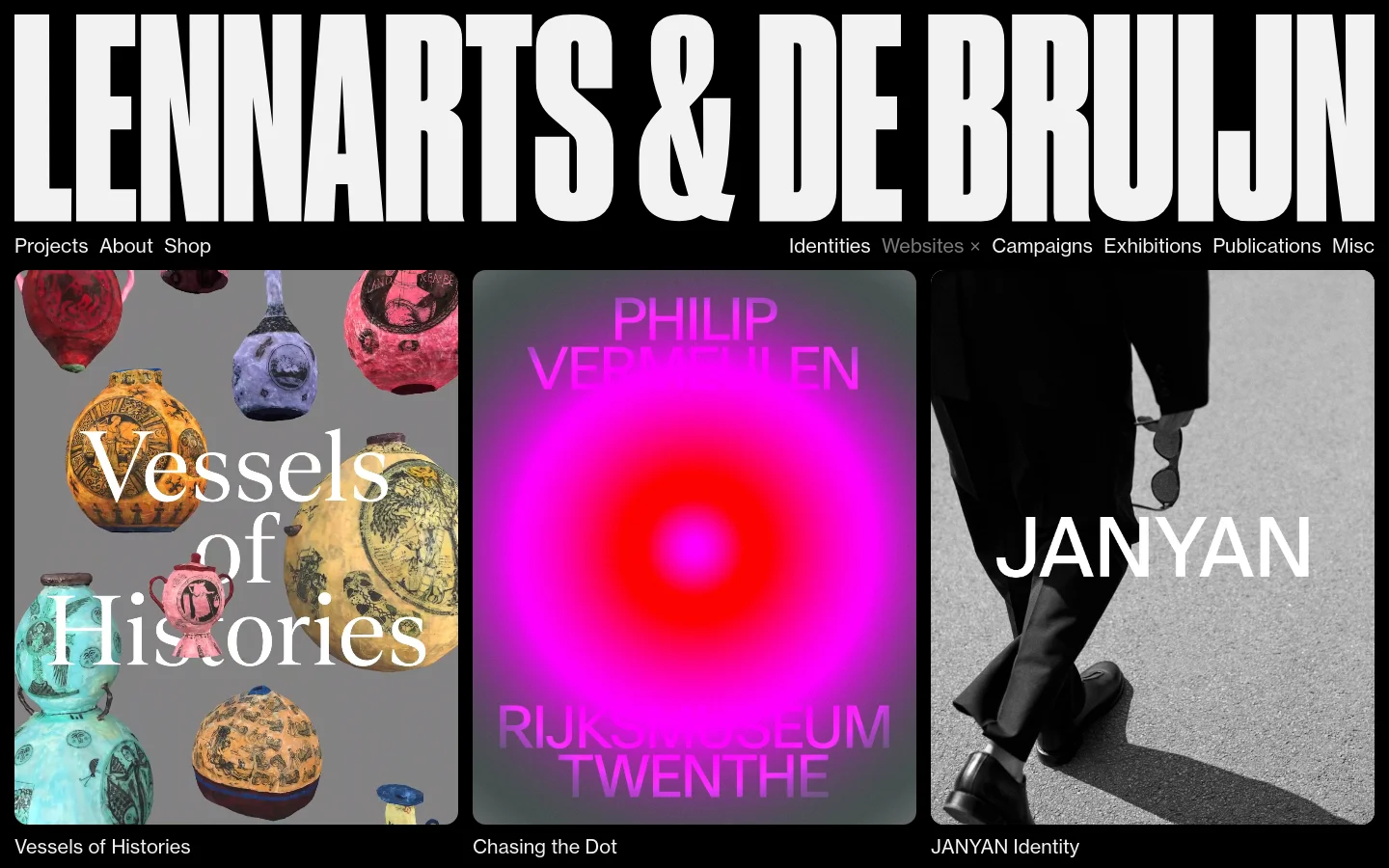 A minimalist website page for Lennarts & De Bruijn featuring a large, bold black logo at the top. Below the navigation menu, a grid of large, colorful project tiles is displayed, including 'Vessels of Histories' with ceramic imagery and 'Chasing the Dot' with a pink and red gradient. The design uses a high-contrast black and white color scheme with large serif typography overlaid on the images.
