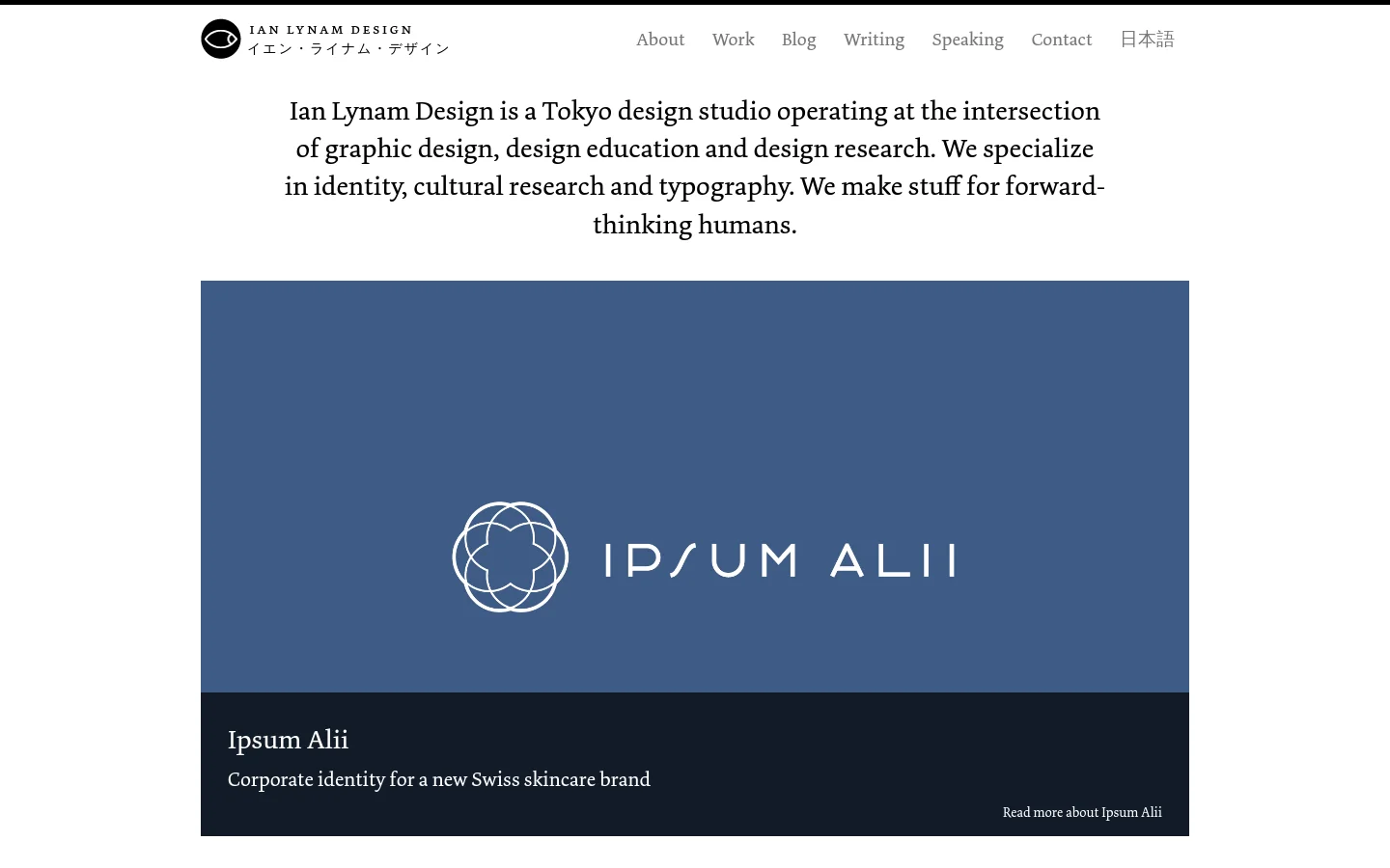 The desktop homepage features a minimalist white background with a centered text introduction about Ian Lynam Design. Below the text, a large project showcase displays a blue rectangular image for 'Ipsum Alii' with a dark caption bar at the bottom containing the project title and a 'Read more' link.