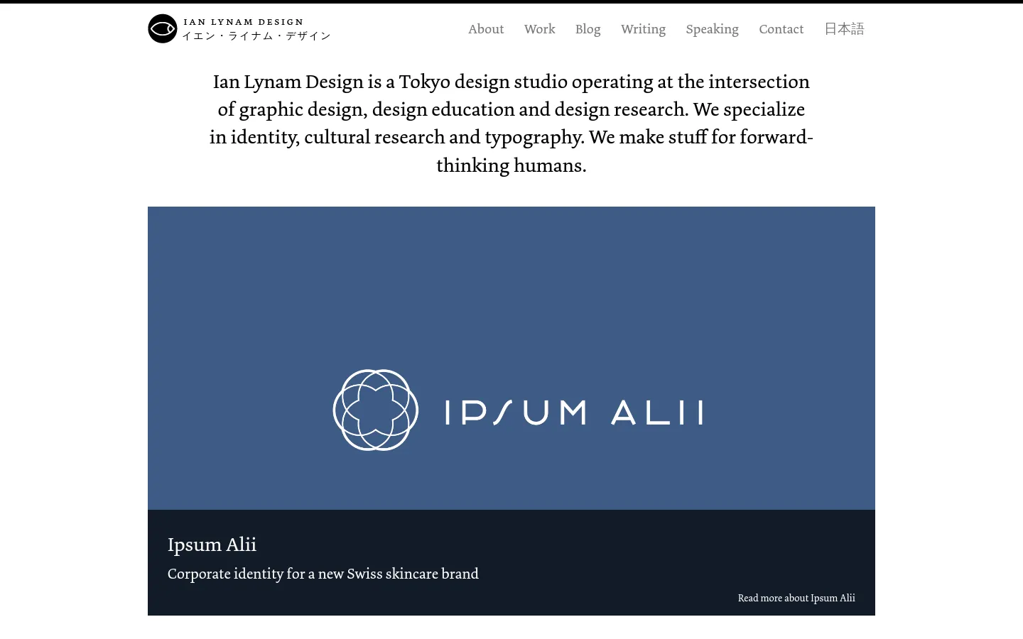 The desktop homepage features a minimalist white background with a centered text introduction about Ian Lynam Design. Below the text, a large project showcase displays a blue rectangular image for 'Ipsum Alii' with a dark caption bar at the bottom containing the project title and a 'Read more' link.