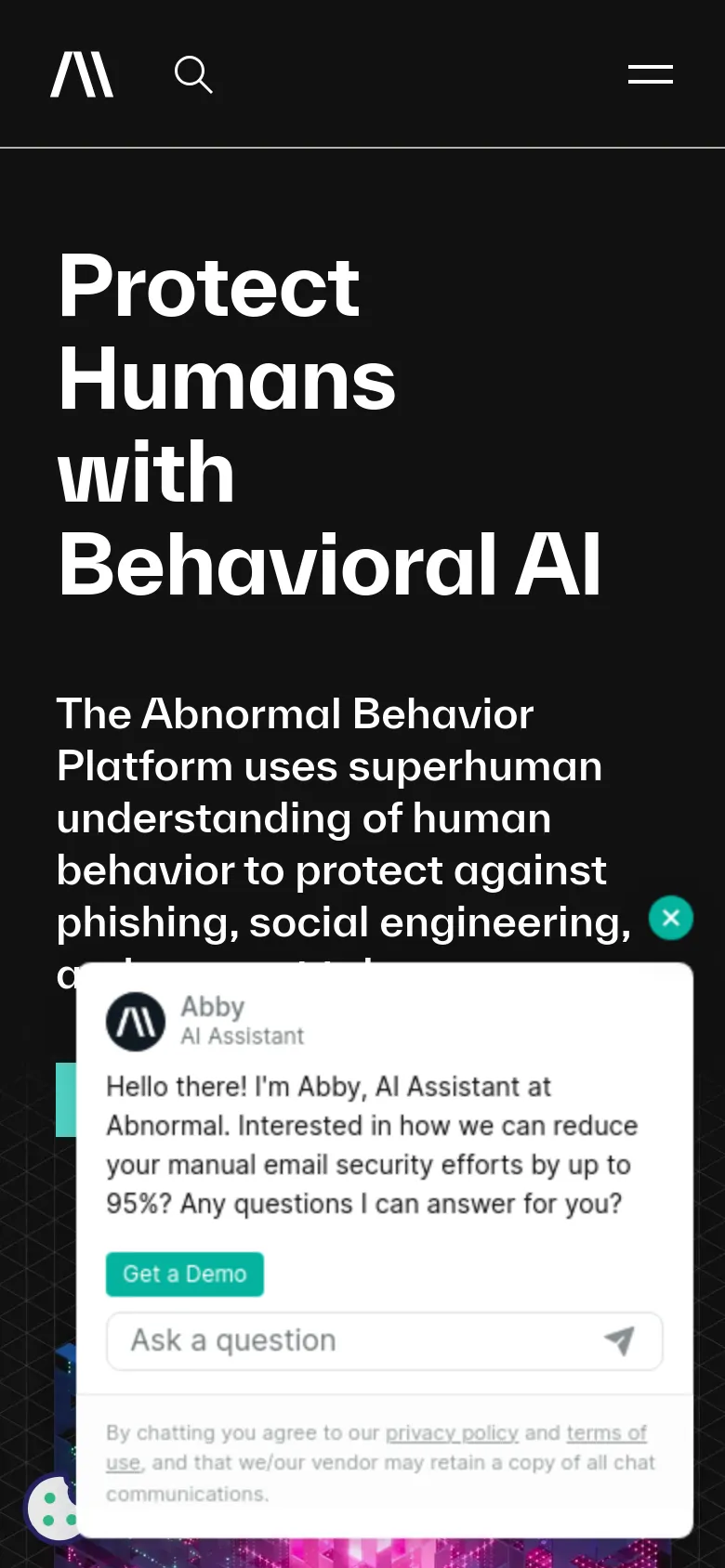 The mobile version presents a vertically stacked layout with the headline 'Protect Humans with Behavioral AI' prominently at the top. The interface is simplified with a hamburger menu and a search icon, and includes an interactive AI assistant chat window overlaying the bottom of the screen.
