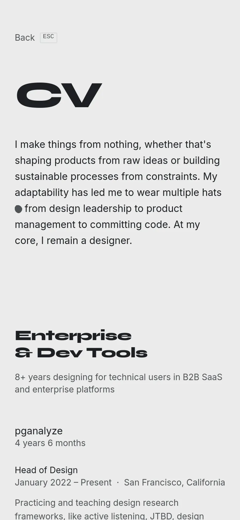 The mobile version maintains the minimalist white and black aesthetic but reflows the content into a single vertical column. The large ink-splatter graphic is removed or repositioned to prioritize the text, and the navigation links 'Back' and 'ESC' are placed at the top left.