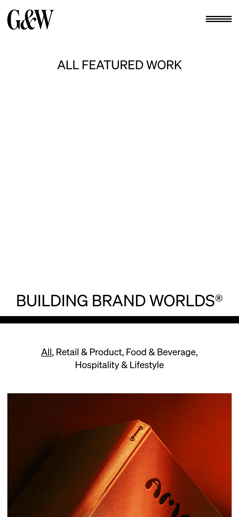The mobile version maintains the minimalist white aesthetic but uses a single-column layout for the content. The 'G&W' logo and hamburger menu are condensed at the top, followed by the 'ALL FEATURED WORK' headline and the 'BUILDING BRAND WORLDS®' title. Project images and category filters are stacked vertically to fit the narrow screen width.