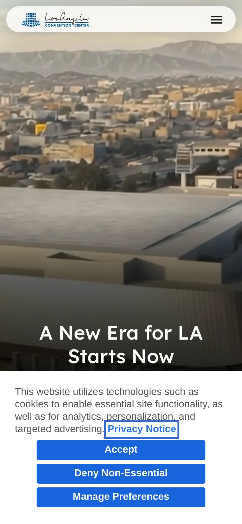 The mobile version displays a vertically oriented hero image showing an aerial view of the convention center and the surrounding city landscape. The navigation is condensed into a hamburger menu icon on the right side of a white header containing the center's logo. The headline 'A New Era for LA Starts Now' is centered prominently over the image, and a cookie consent banner appears at the bottom.
