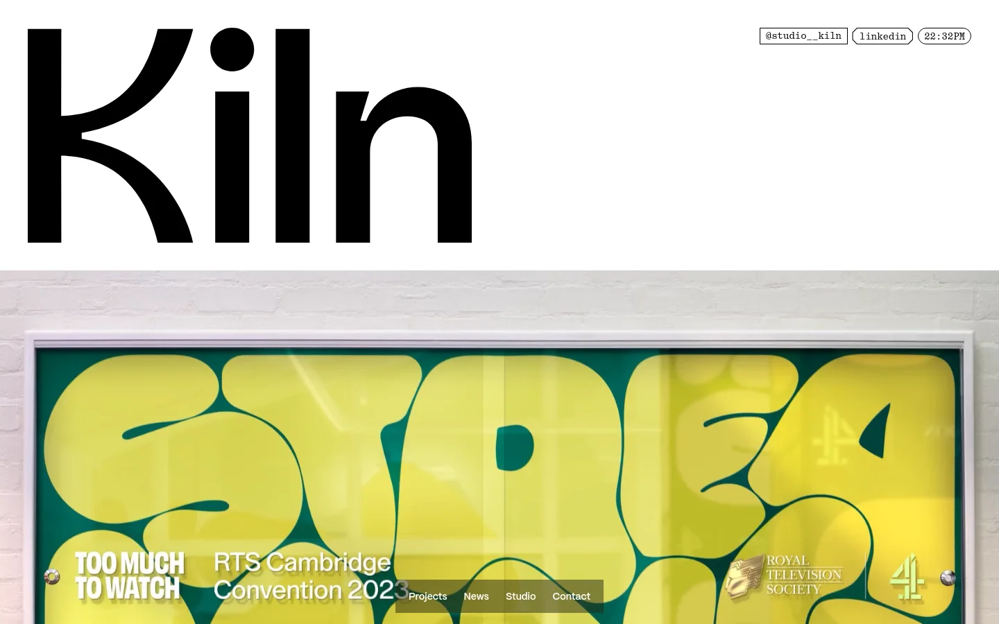 Desktop homepage for Studio Kiln featuring a large black wordmark on a white background. Below the header, a grid of featured project thumbnails showcases brand identity work for clients like Fellowkids, ITV, and BAFTA, accompanied by project details and categories.