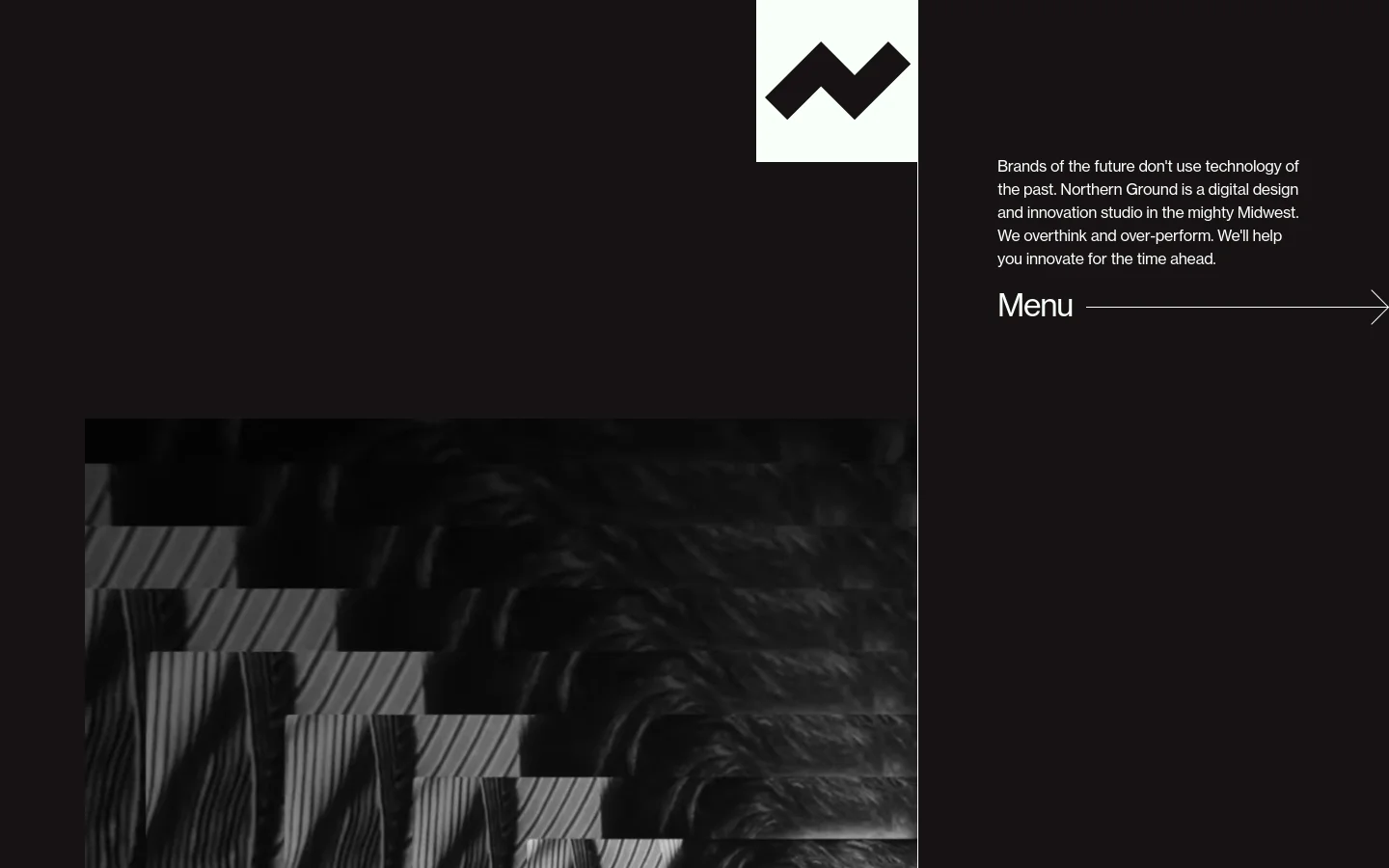 The desktop homepage features a dark, minimalist design with a large, stylized black and white logo at the top. A hero section displays a high-contrast, textured grayscale image alongside white typography that introduces Northern Ground as a digital design studio. The layout uses ample negative space and includes sections for featured work, new projects, and team profiles with clear text links.