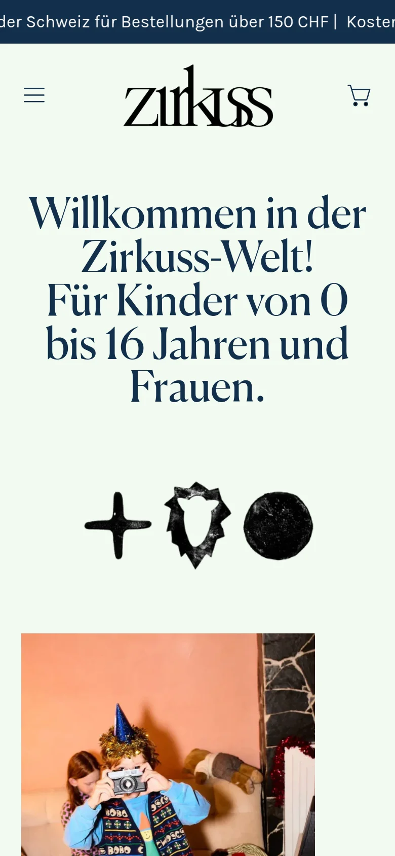 The mobile version maintains the minimalist cream aesthetic and large serif headline but uses a more compact header. The Zirkuss logo is centered between a hamburger menu on the left and a shopping cart icon on the right, with the search and user icons appearing below or integrated into the layout. The central graphic symbols and welcome text remain the focal point of the upper screen.
