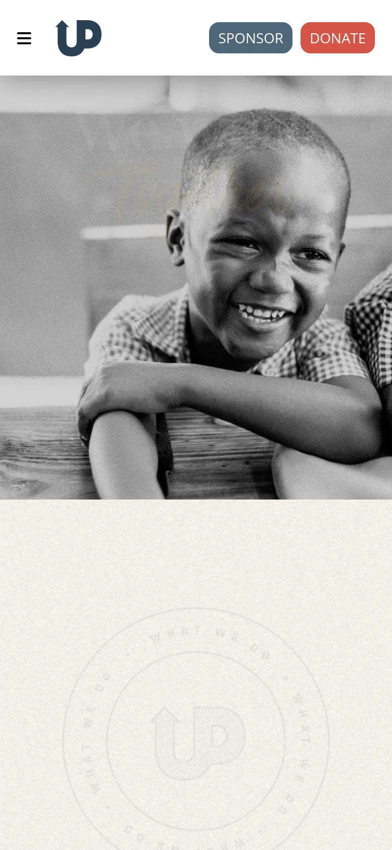 The mobile version shows a simplified layout with a hamburger menu icon on the left and the 'UP' logo in the center. The 'Sponsor' and 'Donate' buttons are prominently displayed below the header, and the hero image of the smiling child is cropped to fit the vertical screen.