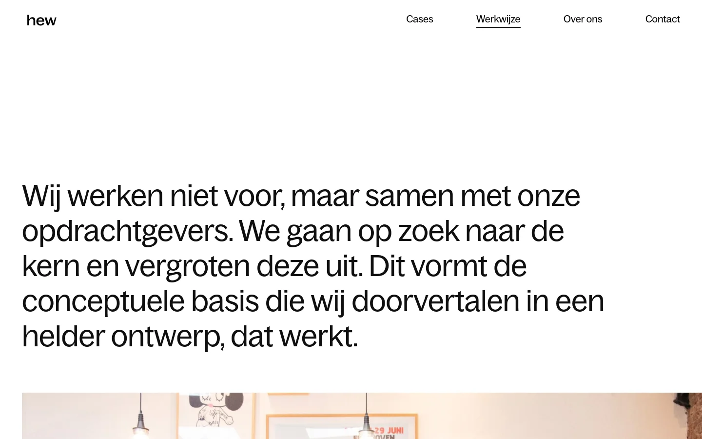 The desktop page features a minimalist white background with a large, bold black headline about the studio's collaborative approach. A horizontal navigation menu is located at the top right, and a wide atmospheric photo of a studio workspace is positioned below the main text.