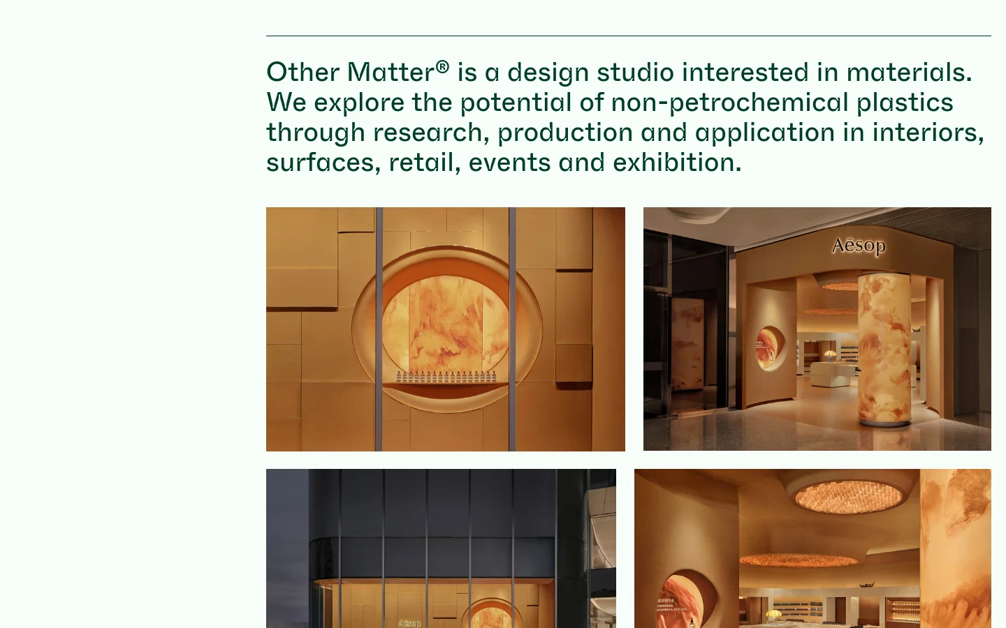 The desktop homepage features a minimalist layout with a white background and dark green serif typography. A large headline introduces the studio, followed by a grid of high-quality, warm-toned photographs showcasing material applications in interior design and retail spaces. Navigation links like 'OM SIGNAGE FILM' and 'SHOP' are arranged vertically on the left side of the screen.