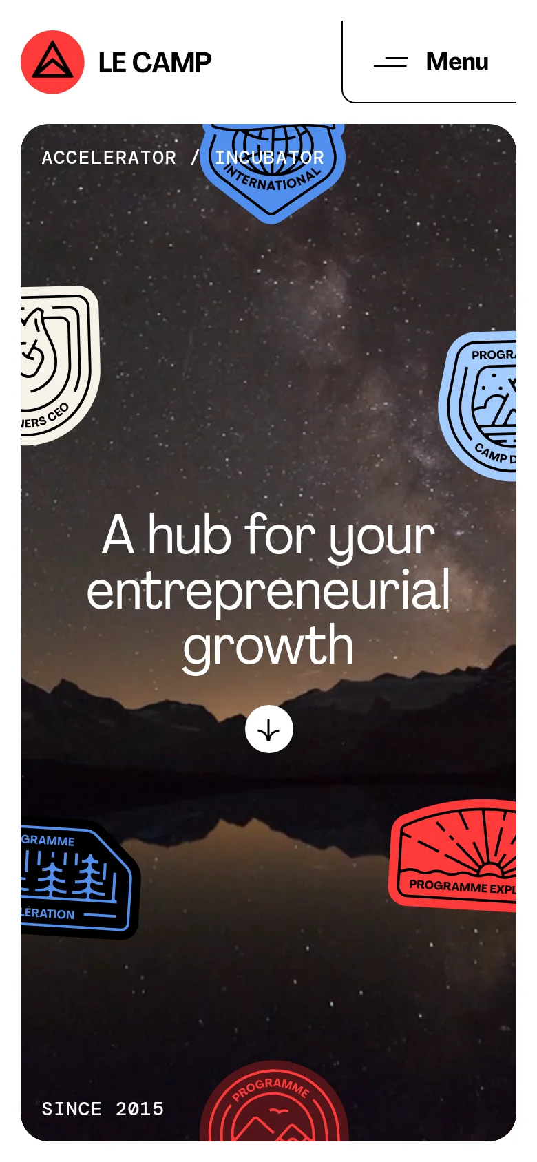 The mobile version presents a vertically oriented view of the starry mountain landscape with the headline 'A hub for your entrepreneurial growth' positioned in the center. The layout is more compact, featuring a simplified header with the logo and a large menu button, and the program patches are scattered around the central text and a downward arrow call-to-action.