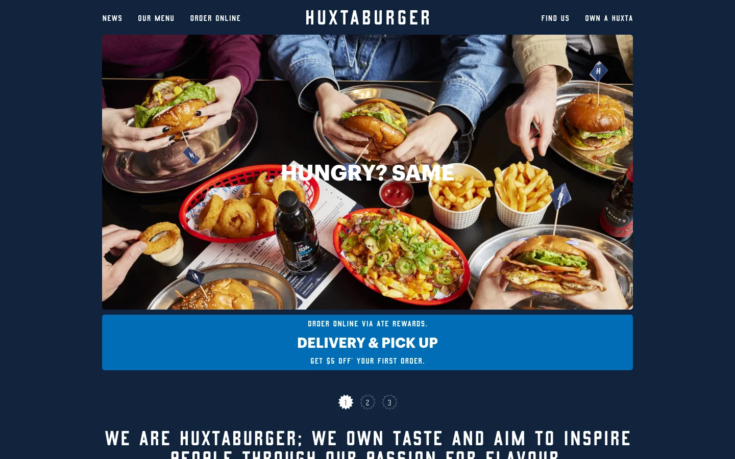 The desktop homepage features a dark navy background with a large hero image of people sharing burgers, fries, and onion rings. A central headline reads 'HUNGRY? SAME' over the food, followed by a bright blue call-to-action banner for 'DELIVERY & PICK UP'. The navigation bar at the top includes links for News, Our Menu, Order Online, Find Us, and Own a Huxta.