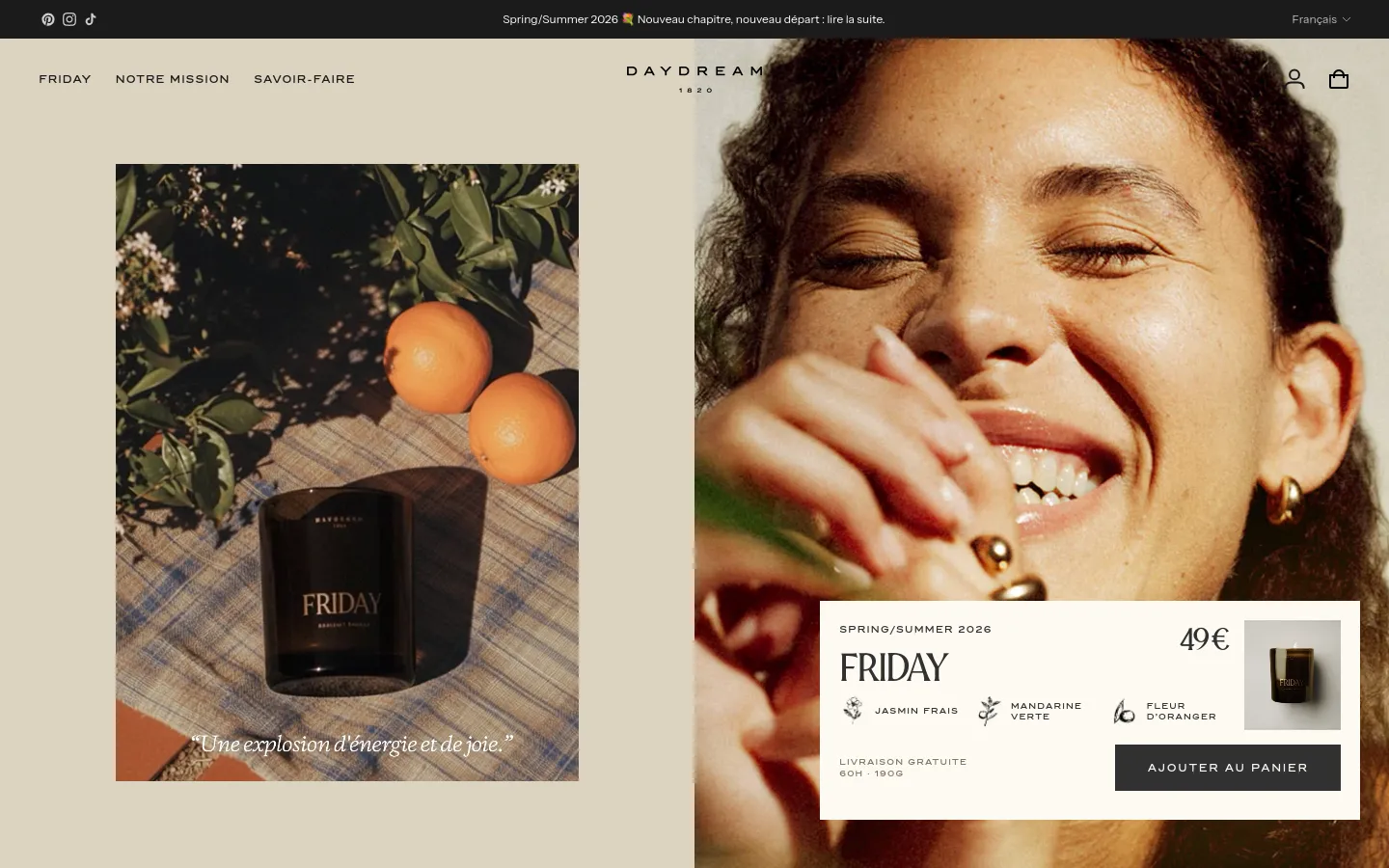 The desktop homepage features a split-screen hero section with a warm, cream-colored background. On the left, a lifestyle photo shows a dark 'Friday' scented candle next to oranges on a blue checkered cloth, while the right side shows a close-up of a smiling person. A product overlay displays the price, scent notes like jasmine and mandarin, and a dark 'Ajouter au panier' call-to-action button.