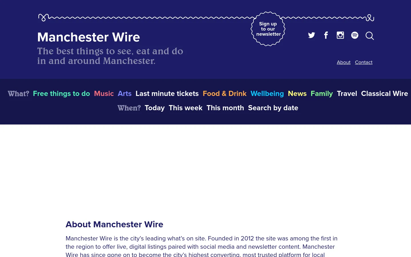 The About page features a wide banner image at the top, followed by a clean white layout with black text and a large 'About Manchester Wire' headline. The content describes the site's history and team members, and the page concludes with a dark blue footer containing the site logo, social media icons, and a navigation menu.