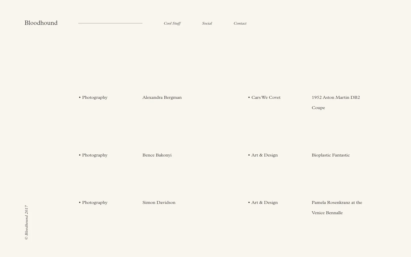 The Bloodhound blog page features a minimalist design with a cream background and black serif typography. A navigation menu at the top includes links for Cool Stuff, Social, and Contact, while the main content is organized into a two-column grid layout listing blog categories and article titles.