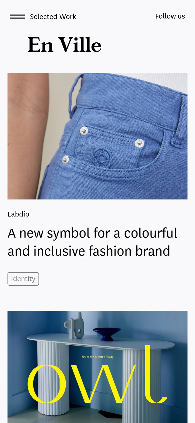 The mobile version maintains the minimalist aesthetic but uses a vertical stack layout. The hero image of blue denim appears at the top, followed by the 'Labdip' title, the project headline, and the 'Identity' tag below it. The navigation is simplified with a hamburger menu and 'Follow us' text at the top.
