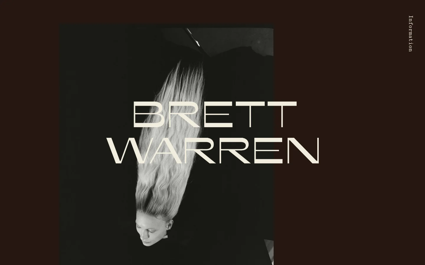 The desktop homepage features a minimalist design with a dark burgundy background. A large, centered hero image shows a black and white portrait of a person with long flowing hair, overlaid with the name 'BRETT WARREN' in large, light-colored sans-serif typography. A vertical 'Information' label is positioned on the far right edge.