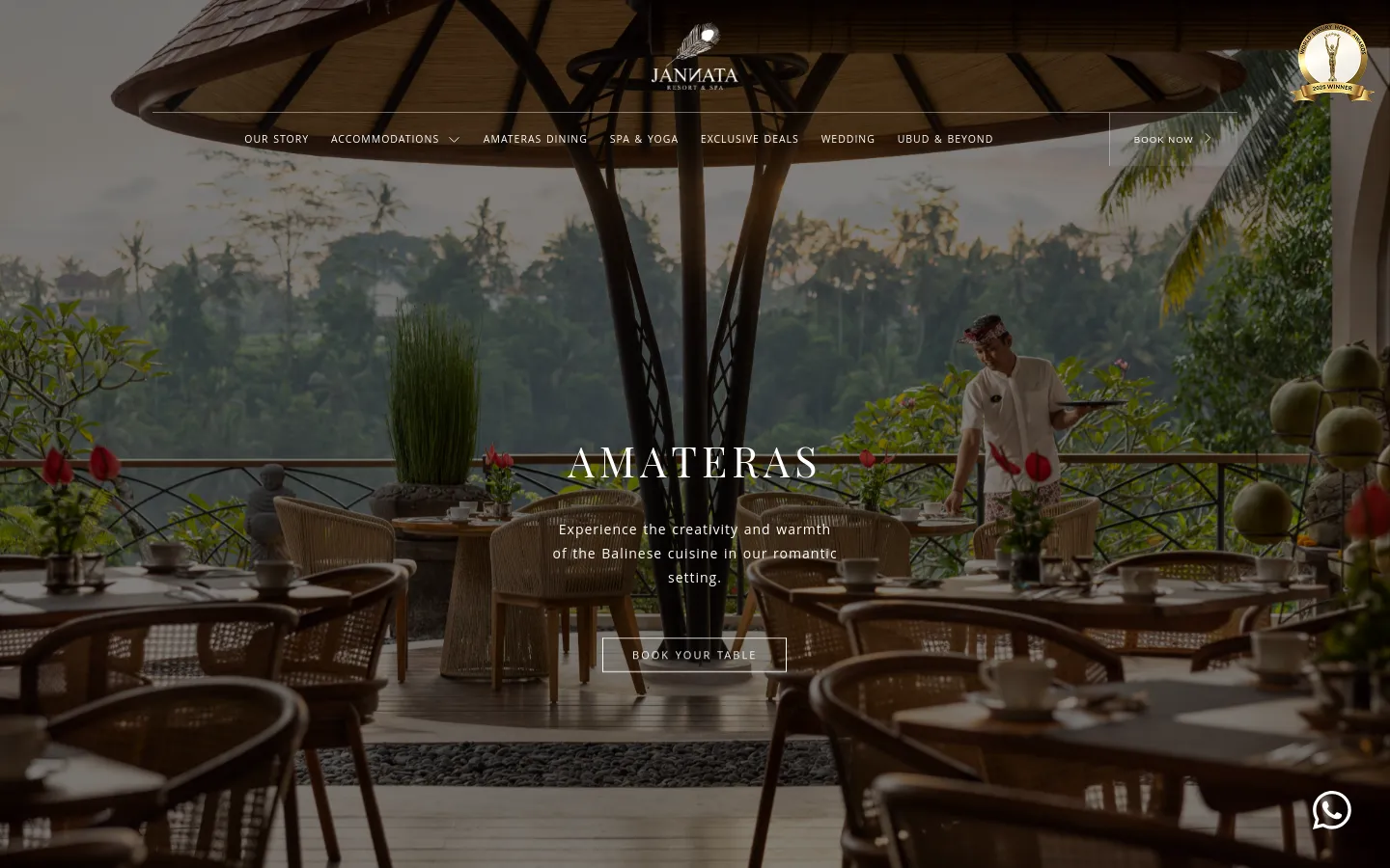 The desktop homepage for Amateras Dining features a full-width hero image of an outdoor restaurant terrace overlooking a lush Balinese jungle. A central heading reads 'AMATERAS' above a subheadline about Balinese cuisine, with a 'BOOK YOUR TABLE' call-to-action button. The navigation menu is spread horizontally across the top, and a 'Book Now' button is positioned on the right.