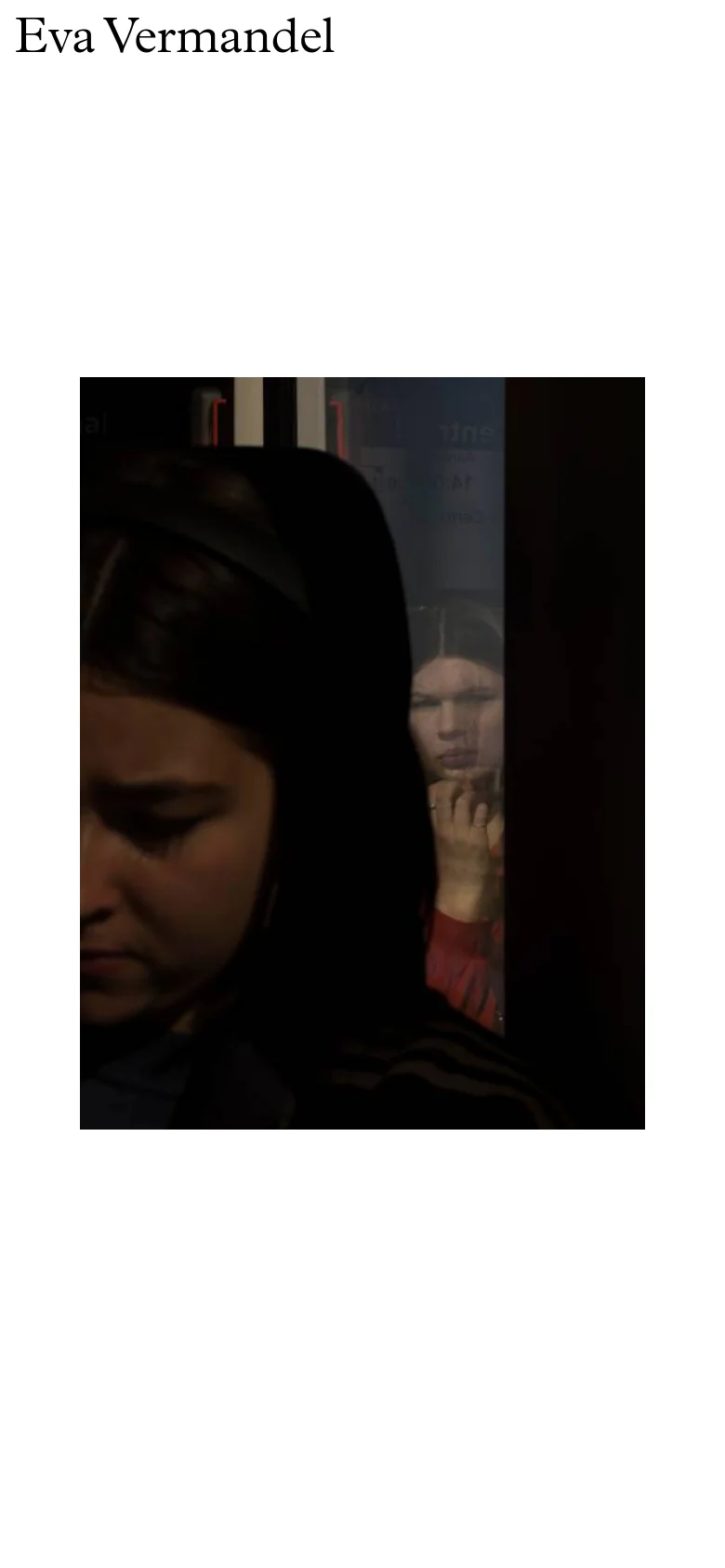 The mobile version maintains the minimalist aesthetic with the 'Eva Vermandel' header at the top. The primary visual is a large, vertically oriented photograph of a lamp and clouds, which occupies the central portion of the screen. The navigation and text elements are simplified to fit the narrow viewport.