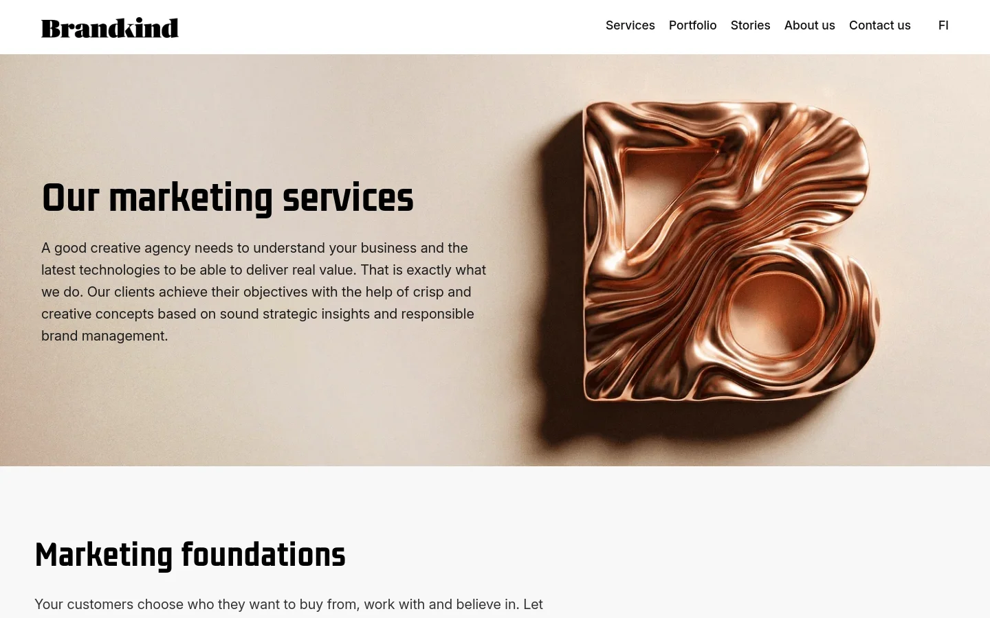 The desktop page features a large hero section with a beige background and a prominent, 3D metallic rose-gold letter 'B' sculpture on the right. A large headline reads 'Our marketing services' next to a brief introductory paragraph. The top navigation bar includes the Brandkind logo and links for Services, Portfolio, Stories, About us, Contact us, and language selection.