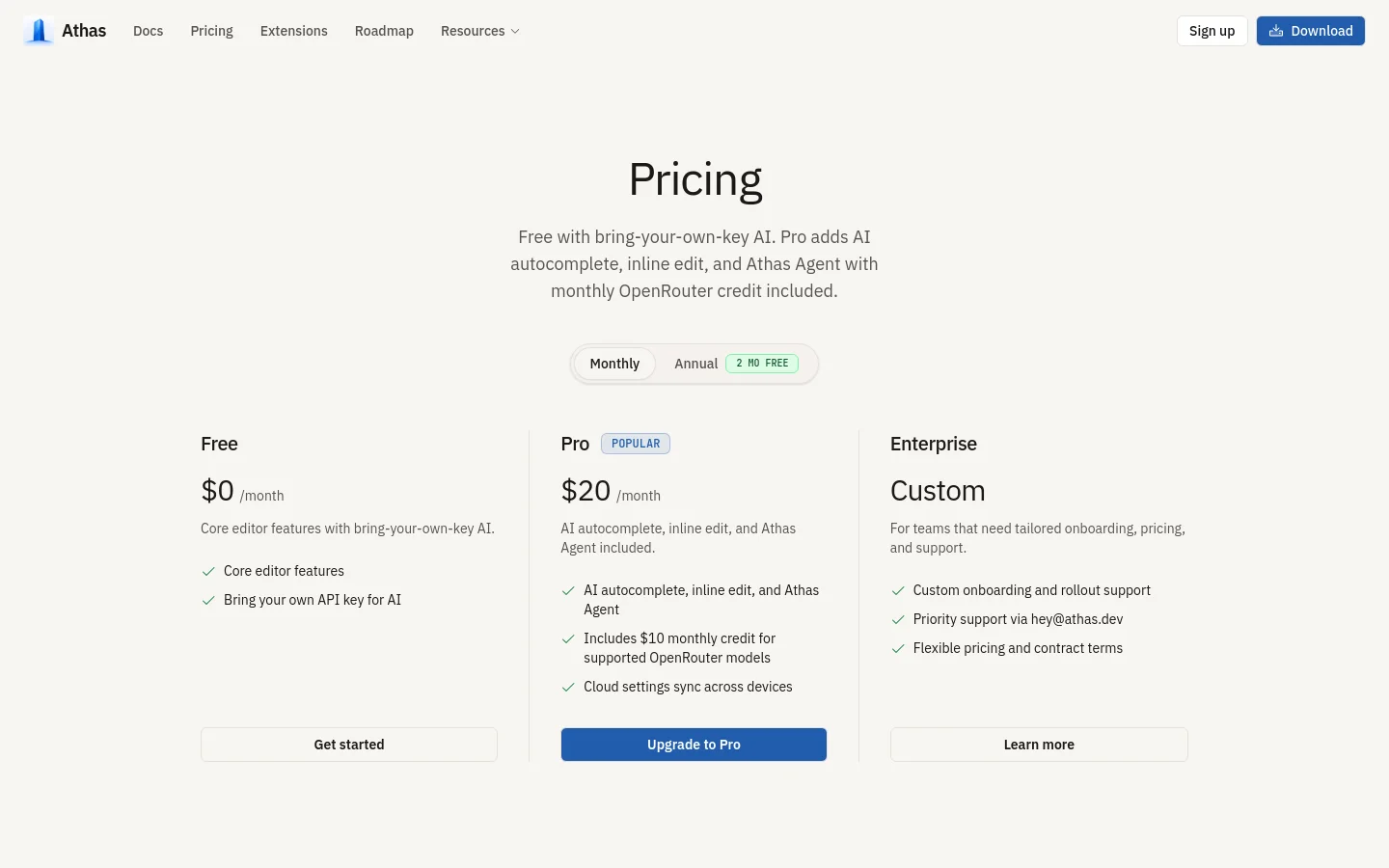The desktop pricing page features a clean, minimalist design with a white background and dark text. A central heading 'Pricing' is followed by a subheadline and a toggle switch for Monthly or Annual billing. Three pricing cards—Free, Pro (labeled 'Popular'), and Enterprise—are arranged side-by-side in a horizontal row, each containing feature lists and call-to-action buttons.