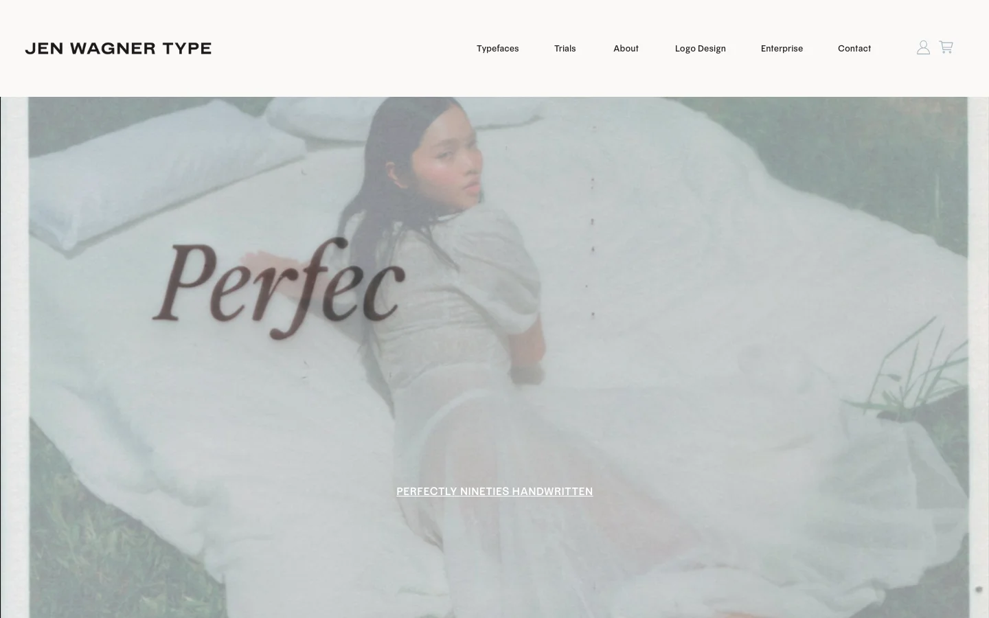 The desktop homepage for Jen Wagner Type features a minimalist white header with navigation links like Typefaces, Trials, and About. A large hero image shows a woman in a white dress on a bed with the text 'Perfectly Nineties Handwritten' overlaid, followed by a 'Trusted by Leading Brands' section displaying logos for Hollister, Amazon, and Tequila Lobos.
