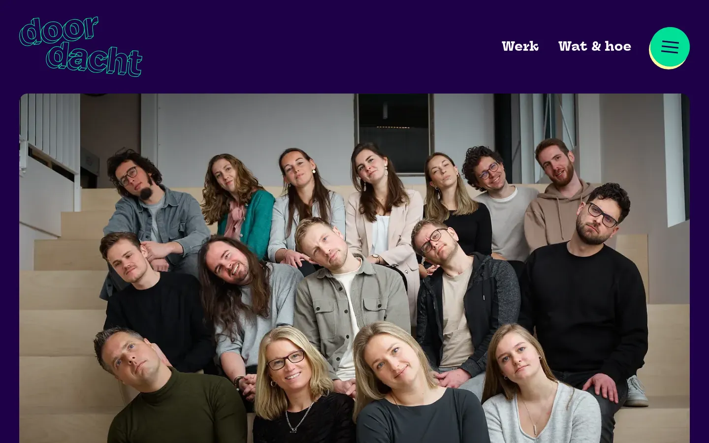 A desktop view of the contact page with a dark purple background. A large hero image shows a diverse team of twelve people sitting on wooden stairs, followed by a large teal headline 'Here’s our number. Call us maybe?' and contact details including address, phone, and email. Below this, a section describes 'Pakhuis 80' next to a photo of a modern building.