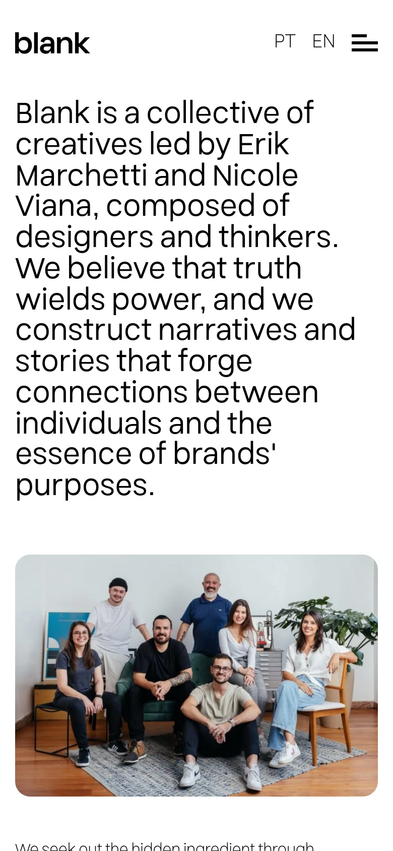 The mobile version maintains the minimalist white and black aesthetic but uses a single-column layout. The large introductory text is stacked vertically, followed by the team photograph which scales to fit the width of the screen. The header remains at the top with the logo, language options, and a condensed menu icon.