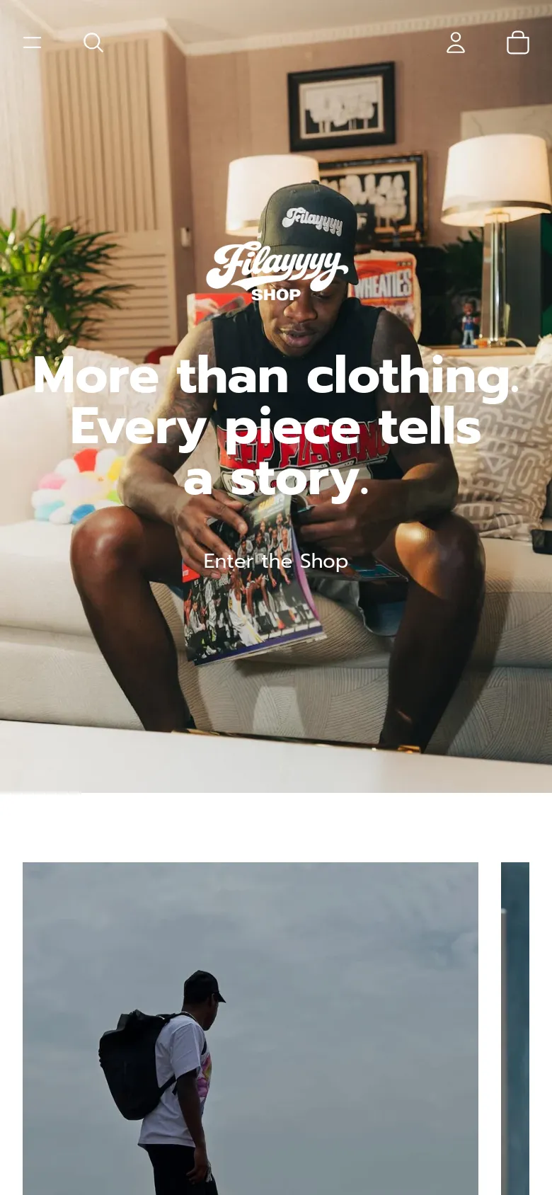 The mobile version presents a vertically stacked layout, beginning with a centered logo and the hero headline 'More than clothing. Every piece tells a story' over a close-up of the man on the couch. The 'Enter the Shop' button is prominently placed in the center, and the navigation is condensed into a hamburger menu icon at the top left to maximize screen space for the imagery.