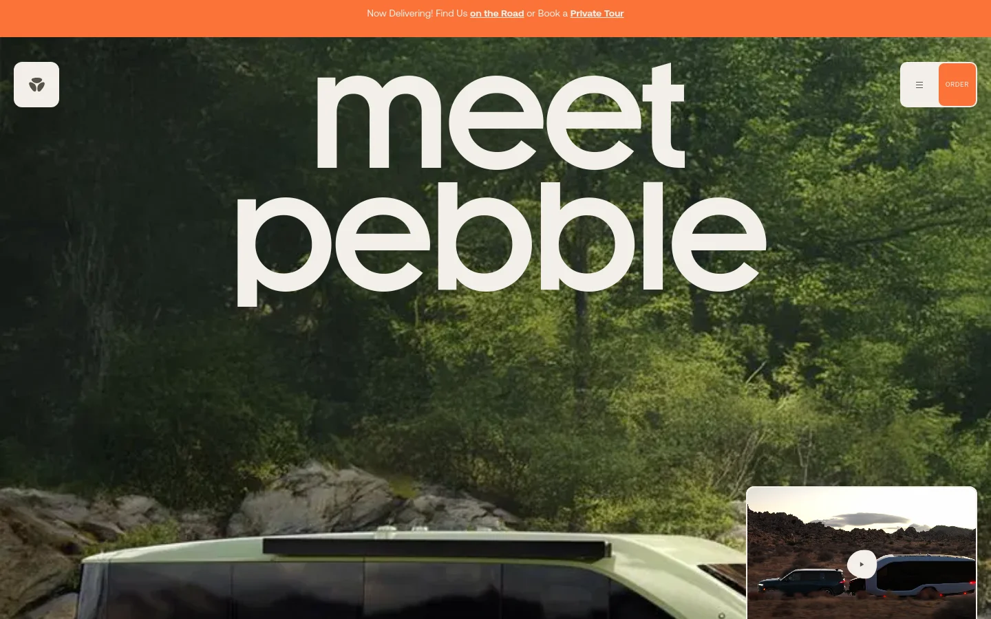 The desktop homepage features a large hero image of a light green electric travel trailer parked in a lush, wooded area with large rocks. Large white text reads 'meet pebble' centered over the image, and an orange announcement bar at the top provides links to find the product on the road or book a tour. Navigation includes a logo on the left and a menu icon with an orange 'ORDER' button on the right.