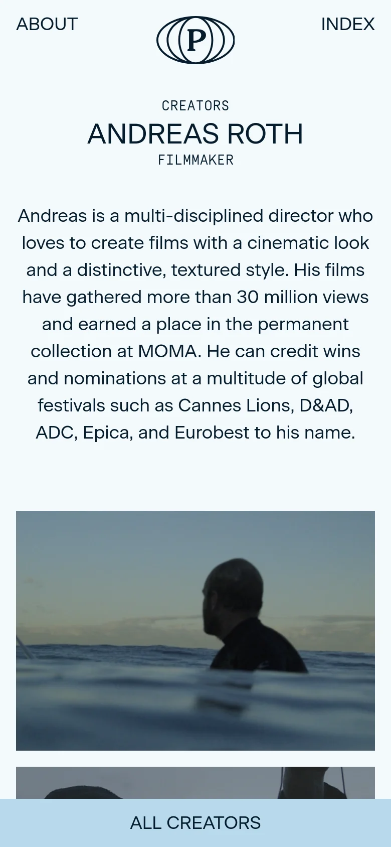 The mobile version maintains the minimalist white and light blue color scheme but stacks the content vertically. The text and headings are centered, and the large cinematic hero image is scaled down to fit the narrower viewport, appearing as a single continuous visual element above the 'ALL CREATORS' button.