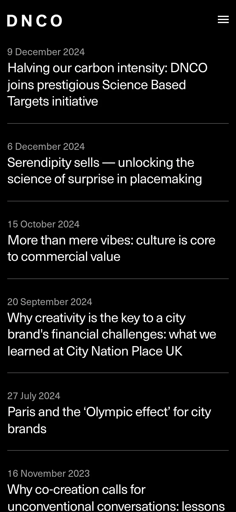 The mobile version maintains the black background and white text but uses a simplified layout. The article list is stacked vertically with dates and headlines, and the top navigation is replaced by a hamburger menu icon on the right side of the DNCO logo.