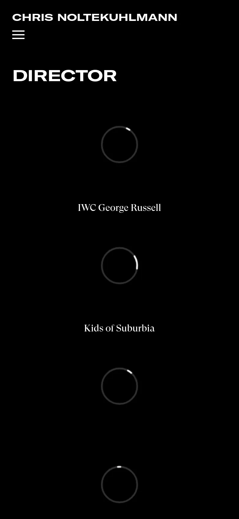 The mobile version features a dark theme with the name 'CHRIS NOLTEKUHLMANN' at the top and a hamburger menu icon on the left. The content is vertically stacked, showing a loading spinner followed by the title 'DIRECTOR' and the project name 'IWC George Russell'.
