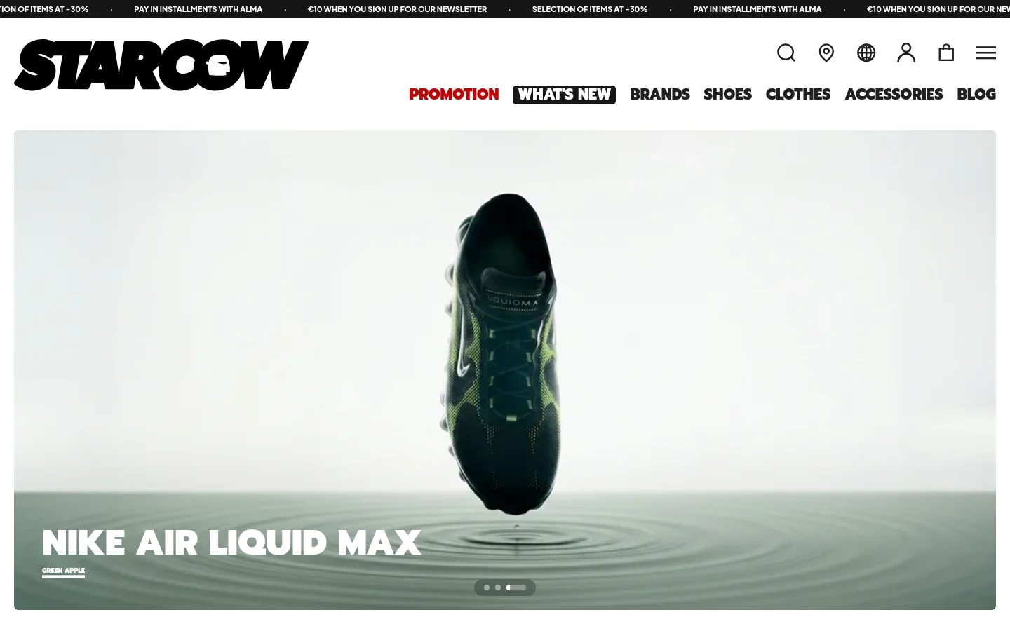 The desktop homepage features a minimalist white header with the Starcow logo and navigation links for Promotion, What's New, Brands, Shoes, Clothes, Accessories, and Blog. A large hero slider showcases high-quality product imagery, starting with a Nike Air Liquid Max sneaker in Green Apple against a clean, watery background. Below the hero section, a 'New in' product grid displays t-shirts with 'Add to cart' buttons.