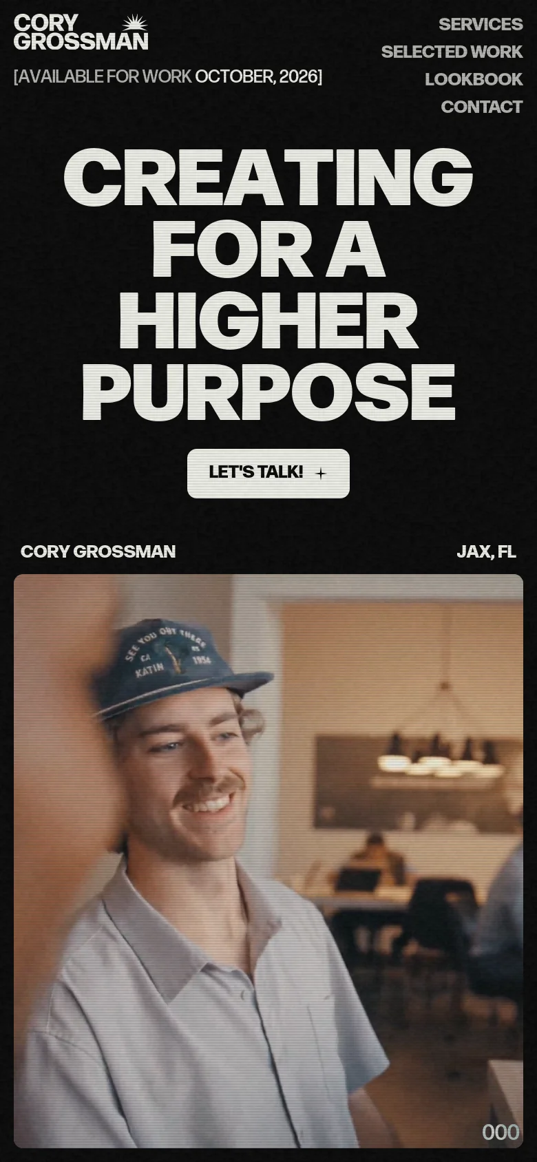 The mobile version uses a vertical layout with the same dark theme and large, impactful white typography. The hero headline 'CREATING FOR A HIGHER PURPOSE' is stacked vertically to fit the narrow screen, followed by the 'LET'S TALK!' button. The navigation is condensed, and the background video shows a close-up of a person wearing a hat.