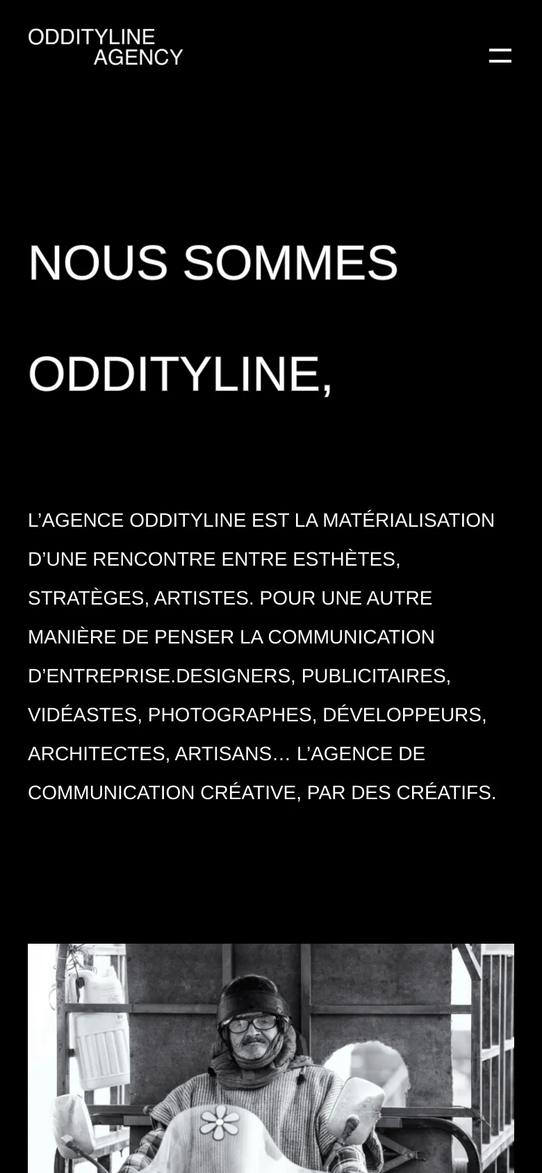 The mobile version uses a similar black and white color scheme but simplifies the layout for a vertical orientation. The large white headline is centered, followed by the descriptive text block, and the navigation is condensed into a hamburger menu icon at the top right.