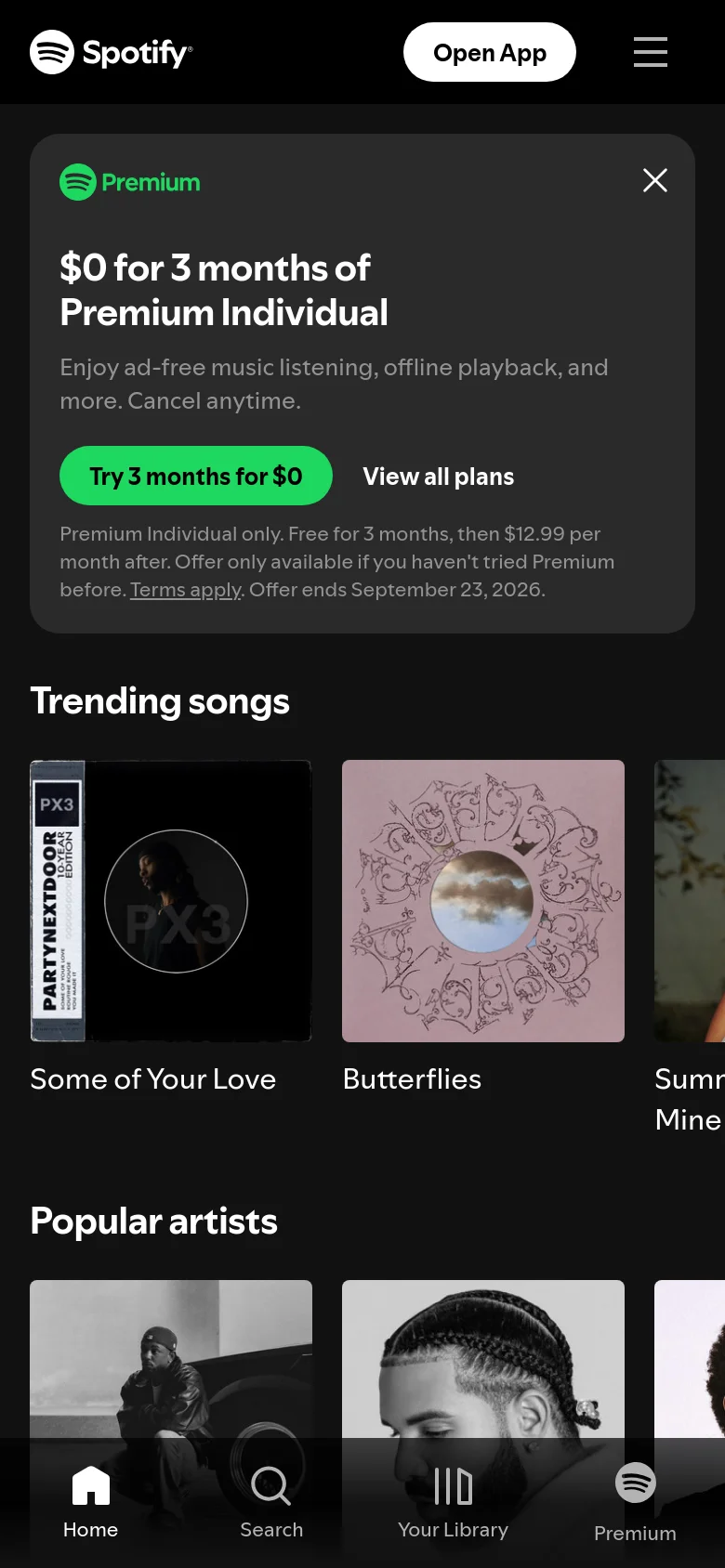 The mobile version presents a simplified vertical layout with a bottom navigation bar containing icons for Home, Search, Your Library, and Premium. The content sections like 'Trending songs' and 'Popular artists' are stacked vertically, and the promotional banner is condensed to fit the smaller screen width.