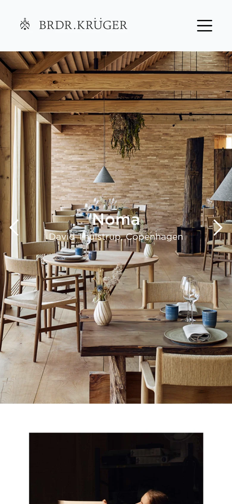 The mobile version simplifies the layout, replacing the top navigation bar with a hamburger menu icon next to the Brdr. Krüger logo. The hero image, featuring 'Noma' by David Thulstrup, spans the full width of the screen, maintaining the large directional arrows for navigation.