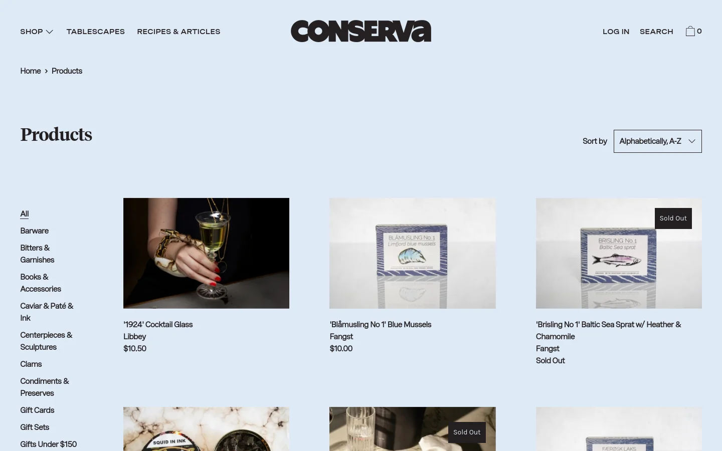 The desktop product page features a clean, minimalist layout with a light blue background and a black logo at the top. A sidebar on the left lists various product categories, while the main area displays a grid of product images with titles, brand names, and prices. A sort dropdown menu is located at the top right of the product grid.