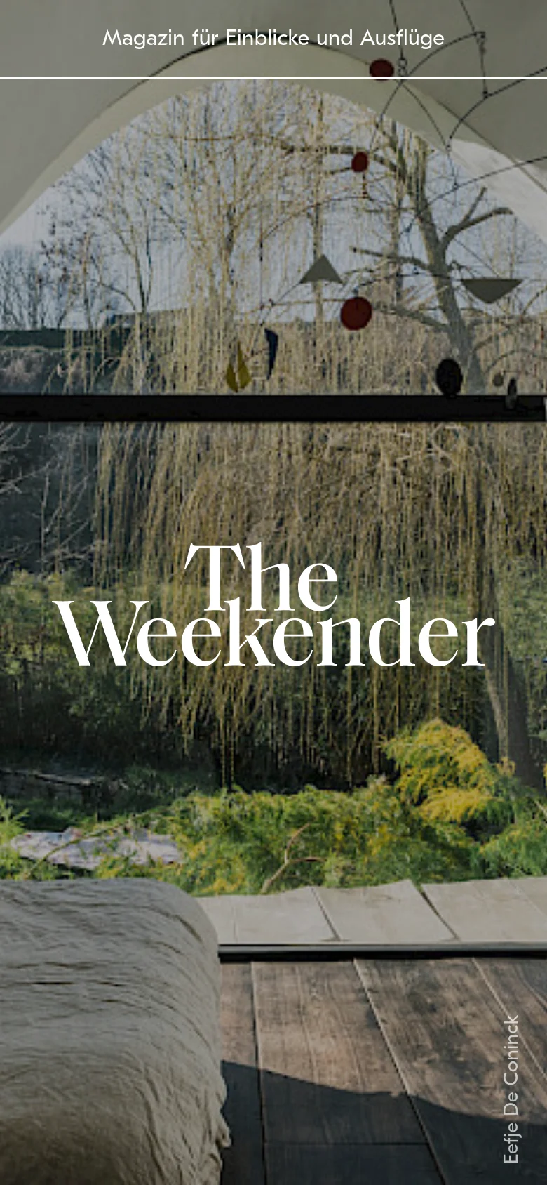 The mobile version maintains the same cinematic hero imagery and white serif typography, but the layout is vertically oriented to fit a smartphone screen. The text 'The Weekender' is centered and scaled to fit the narrower width, and the background image is tightly cropped to focus on the view through the cabin window.