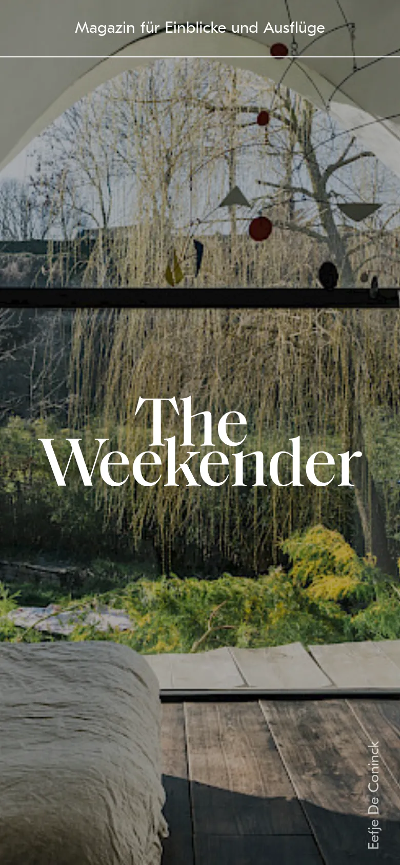 The mobile version maintains the same cinematic hero imagery and white serif typography, but the layout is vertically oriented to fit a smartphone screen. The text 'The Weekender' is centered and scaled to fit the narrower width, and the background image is tightly cropped to focus on the view through the cabin window.