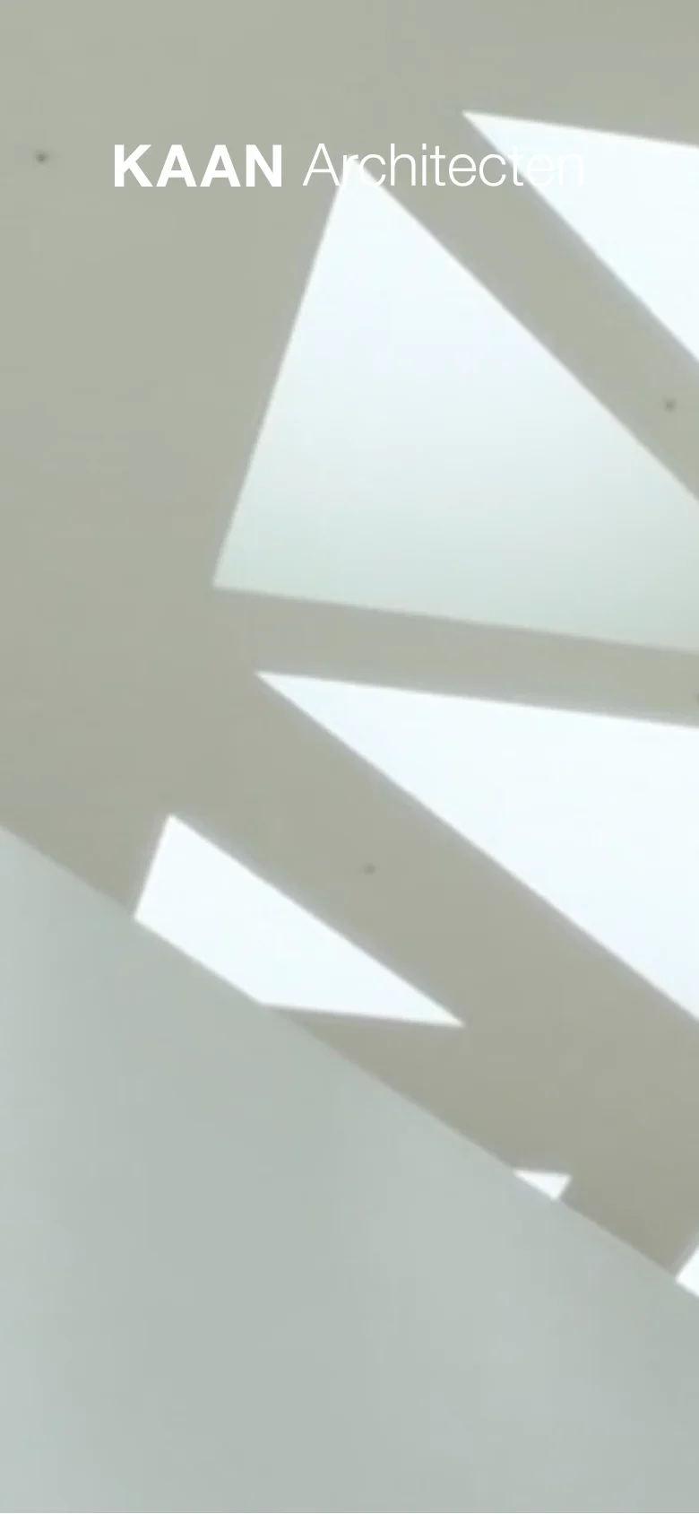 The mobile version maintains the minimalist aesthetic, focusing on the large, abstract geometric light pattern as the primary visual. The 'KAAN Architecten' logo is positioned at the top, and the layout is vertically stacked to accommodate a smaller screen, prioritizing the hero imagery and simplified navigation.