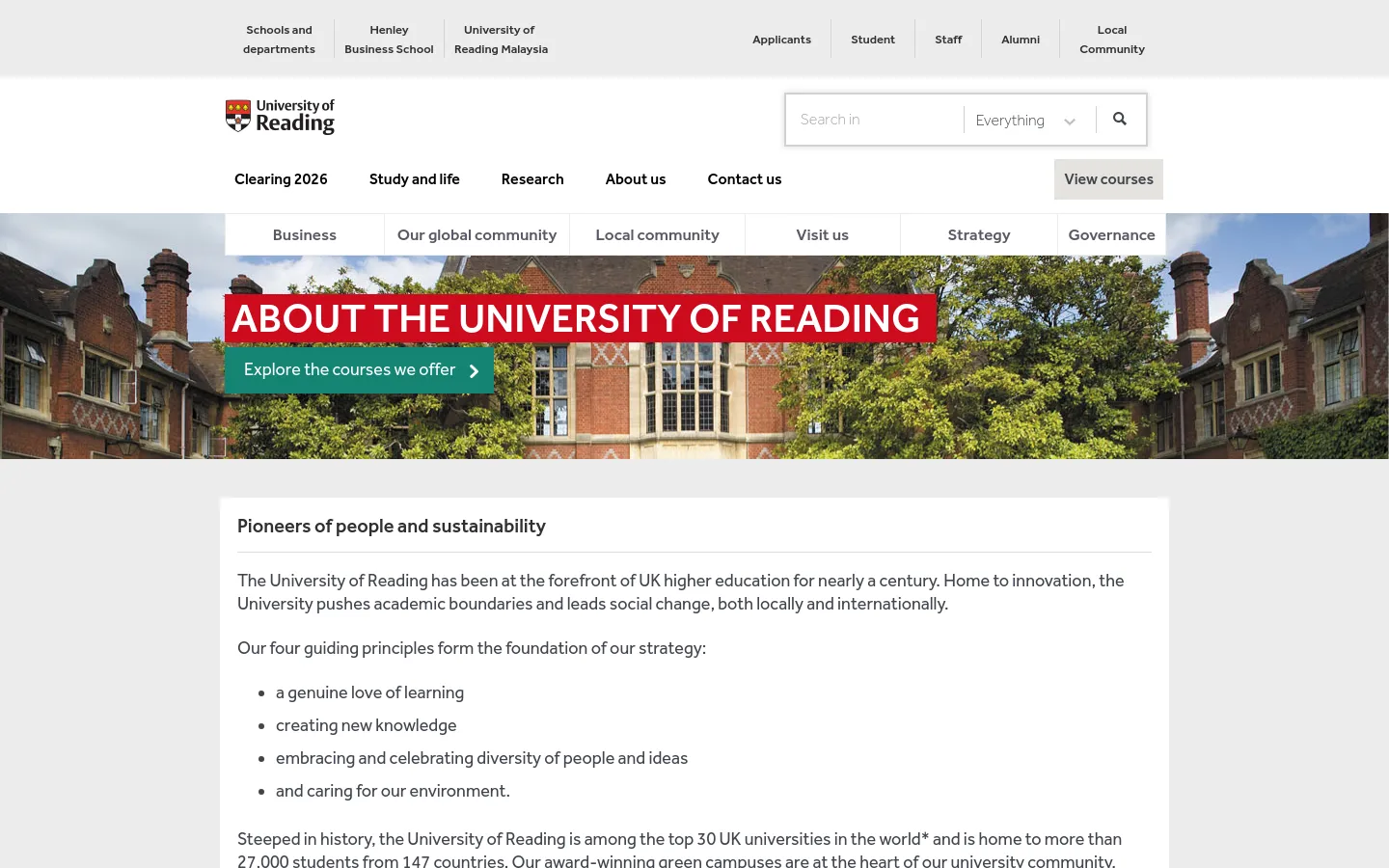 The desktop page features a white header with the University of Reading logo, a search bar, and a navigation menu including 'About us'. A large hero image shows a brick university building behind lush green trees, overlaid with a red banner reading 'ABOUT THE UNIVERSITY OF READING' and a teal call-to-action button 'Explore the courses we offer'. Below the hero, a white content area displays the headline 'Pioneers of people and sustainability' followed by descriptive text and a bulleted list.