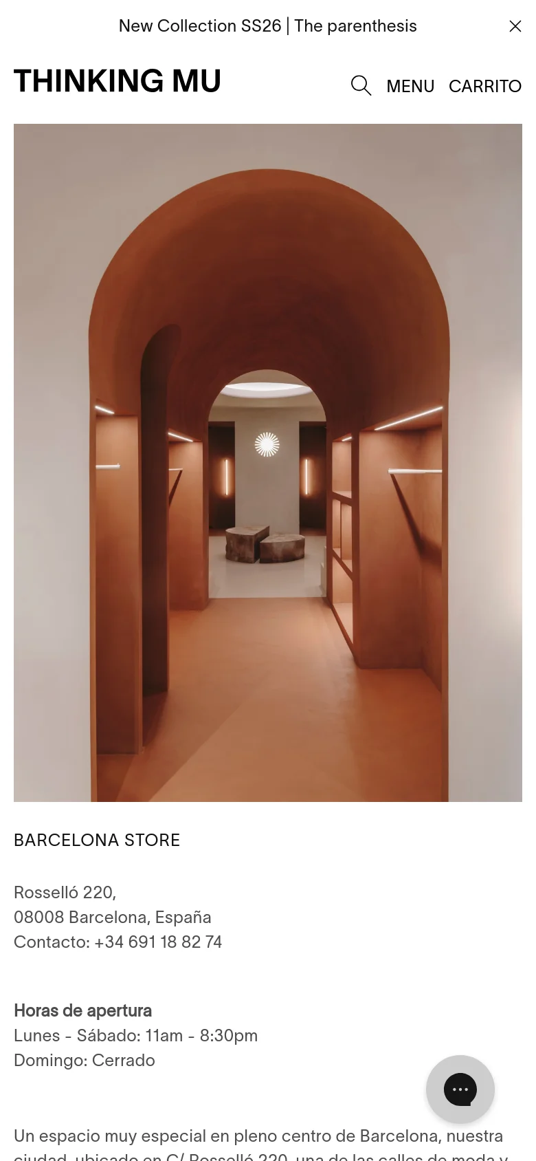 The mobile version uses a single-column vertical layout, placing the large terracotta interior photo at the top, followed by the store details and text below. The navigation is condensed into a 'MENU' text link with a search icon, and the chat icon remains anchored at the bottom right.