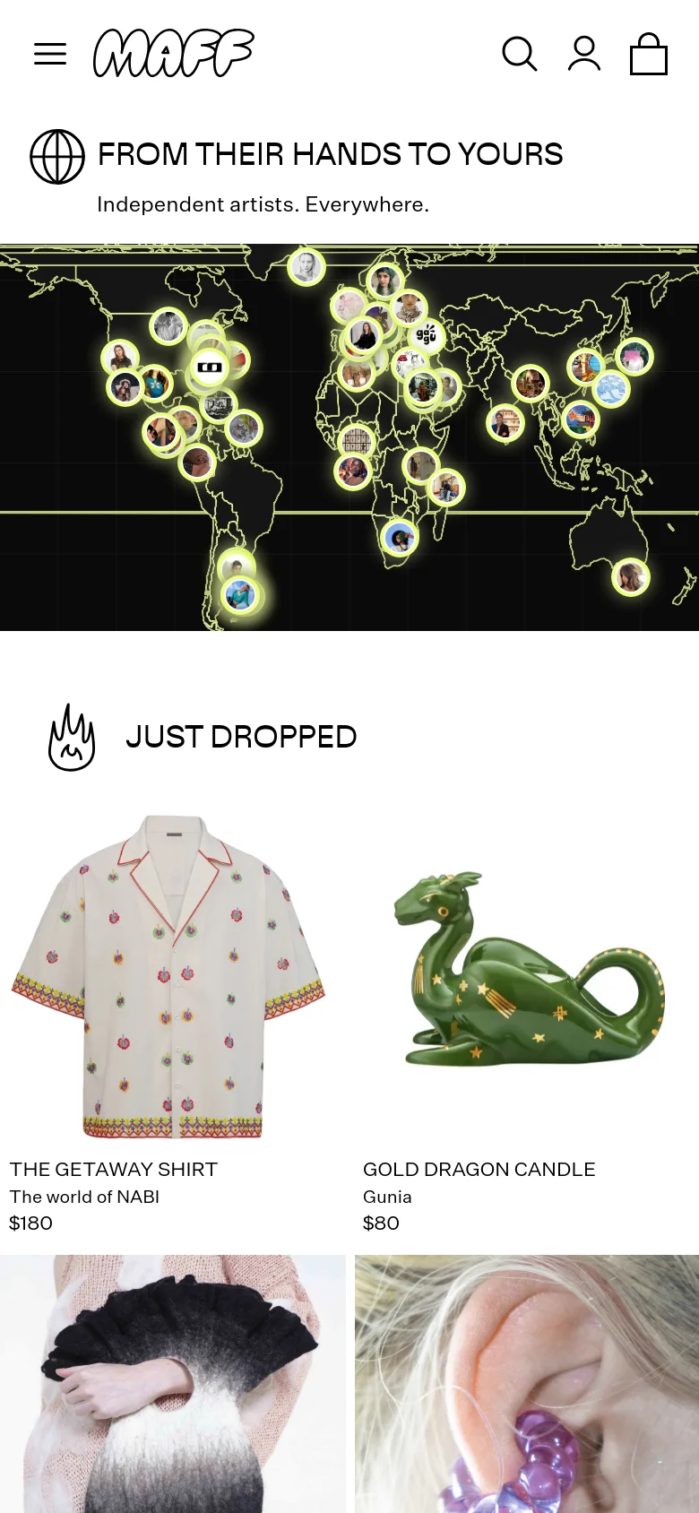 The mobile version uses a condensed layout with a hamburger menu and the MAFF logo at the top. The hero section maintains the world map with artist portraits and the 'FROM THEIR HANDS TO YOURS' headline, but the map and text are scaled for a vertical screen. The 'JUST DROPPED' product grid follows, displaying items in a single or double column format.