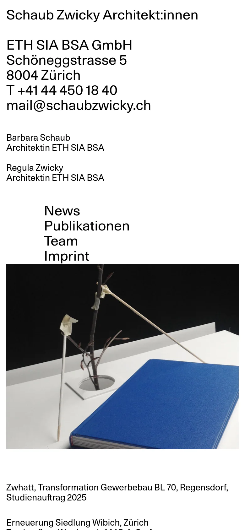 The mobile version uses a single-column vertical layout, stacking the company name, contact details, and navigation links at the top. A large hero image of an architectural model and blue book follows the text, with project details listed below in a continuous scroll.
