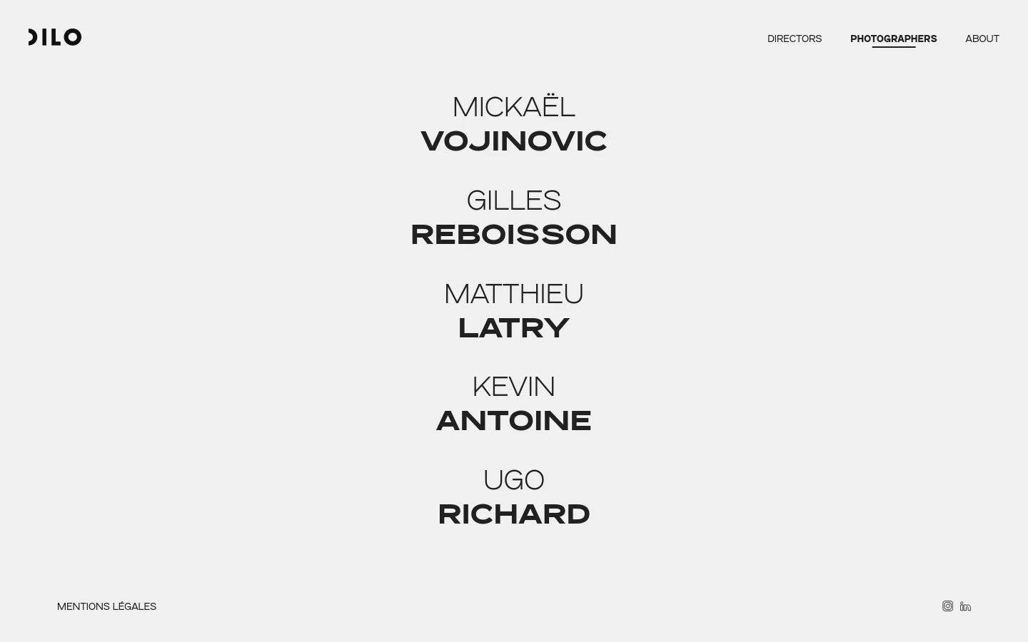 The desktop page features a minimalist white layout with the DILO logo in the top left and navigation links for Directors, Photographers, and About in the top right. The center displays a vertical list of photographer names in bold black typography, including Mickaël Vojinovic, Gilles Reboisson, Matthieu Latry, Kevin Antoine, and Ugo Richard. Footer links for legal mentions and social media icons are positioned at the bottom.