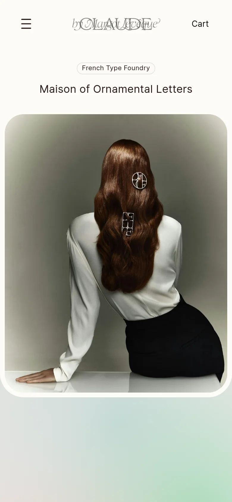 The mobile version simplifies the layout with a centered logo and a hamburger menu icon on the left, with 'Cart' on the right. The main content displays the 'Maison of Ornamental Letters' headline followed by a single, large arched image of a woman's hair with decorative clips, creating a vertical, focused scrolling experience.