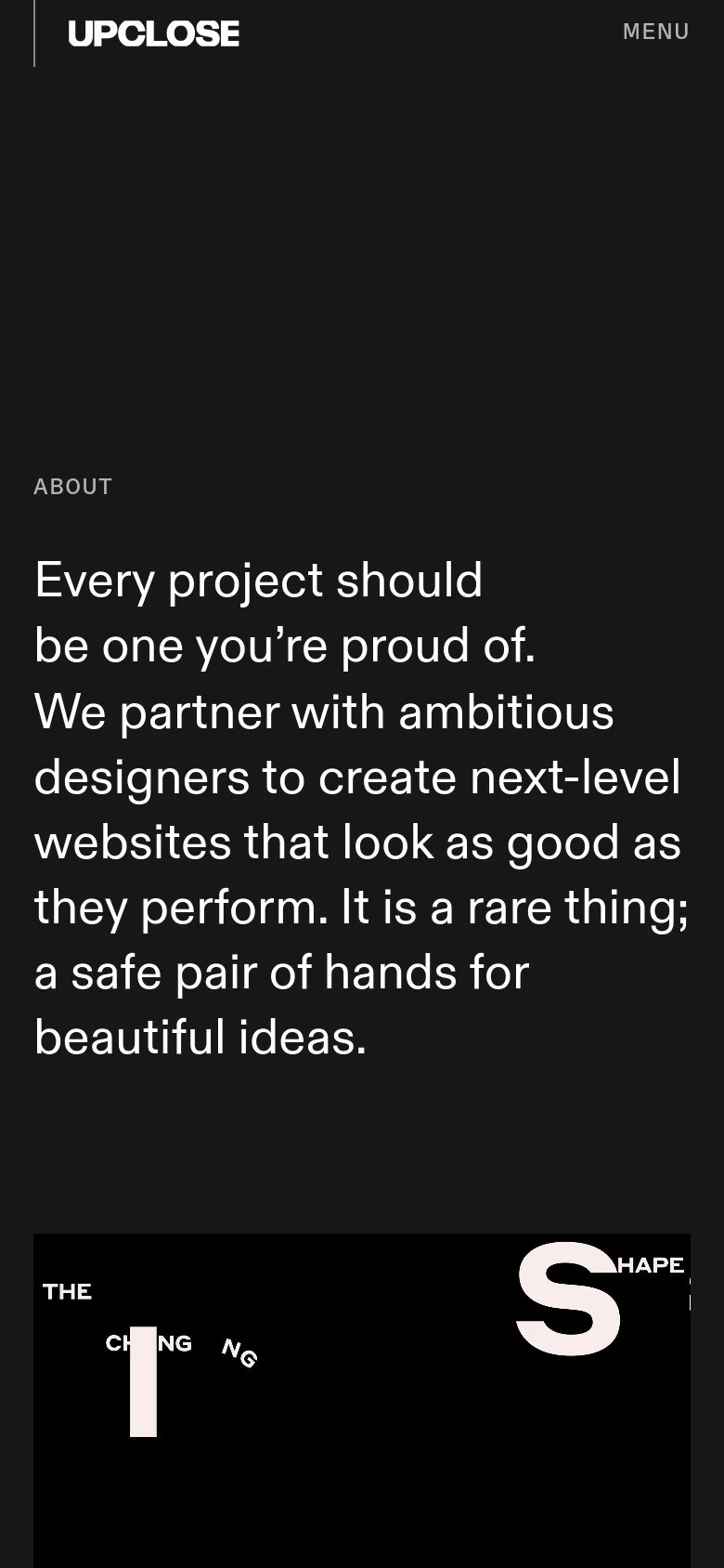 The mobile version maintains the dark aesthetic and white text but uses a stacked layout for readability. The navigation is condensed into a 'MENU' button at the top right, and the hero text is centered and scaled to fit the narrower screen width.