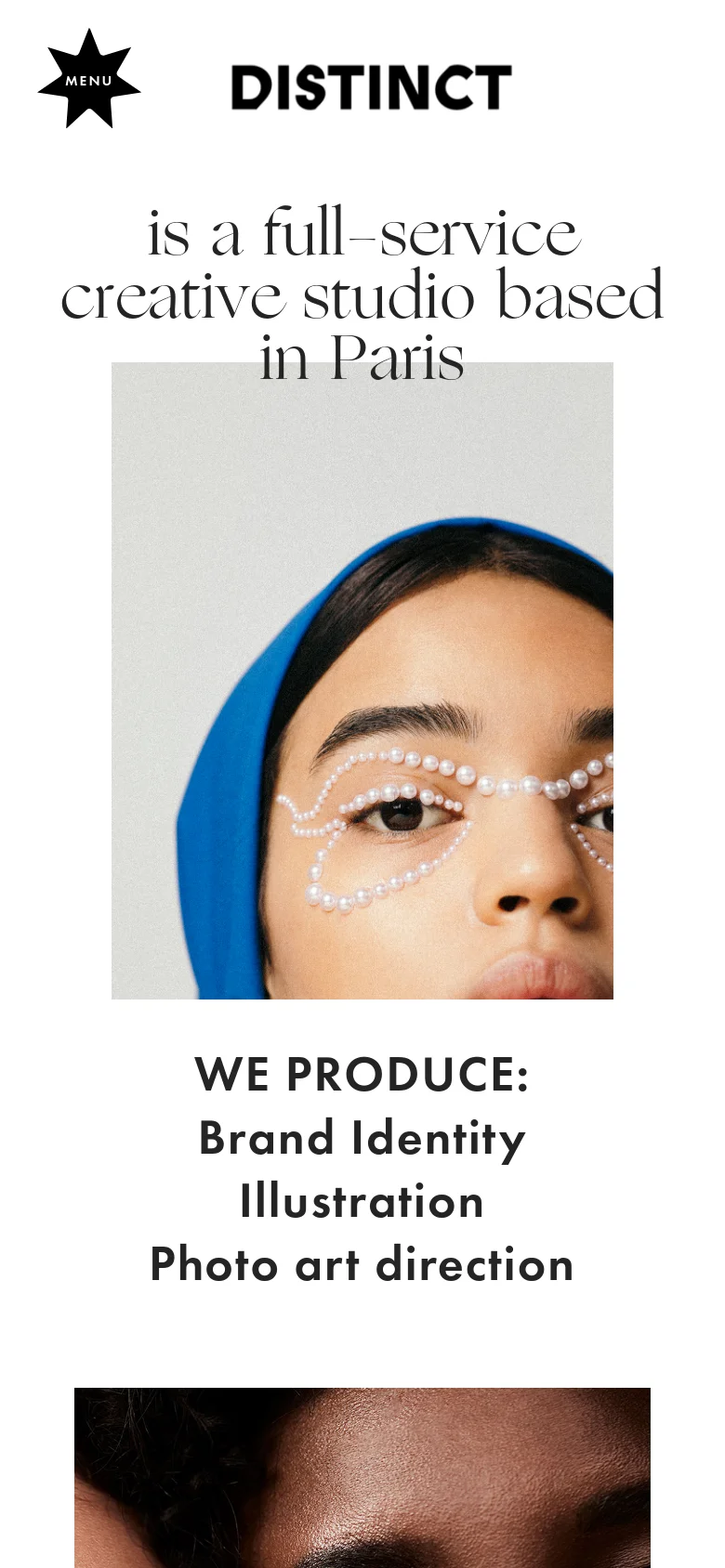 The mobile version uses a vertical layout with a large star icon and 'MENU' label in the top left. The hero section features a close-up portrait of a person with pearls applied around their eyes, followed by a bold text section listing services: 'WE PRODUCE: Brand Identity, Illustration, Photo art direction'.